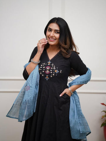 ✨ Dazzling Anarkalis with intricate mirror work — perfect for twirling through the festivities in style and grace.  🌸💃 “Anarkali elegance + mirror work shine = perfect Navratri vibes ✨”